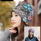 Versatile knitted pile hat with small embroidered flowers that show your face